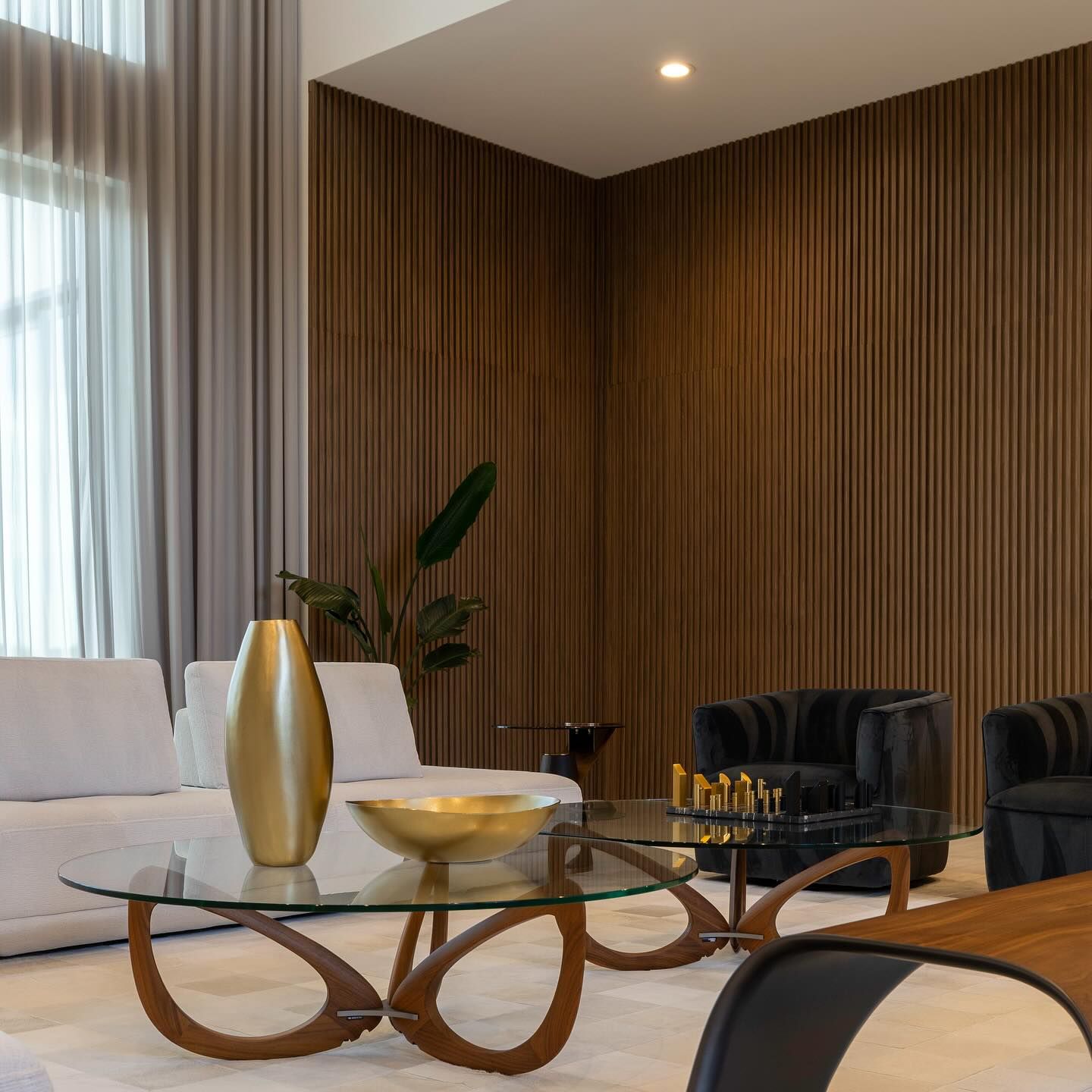 Living room with walnut slat wall panels